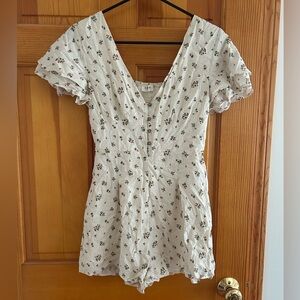 Storia Floral Flutter Sleeve Button Front Romper